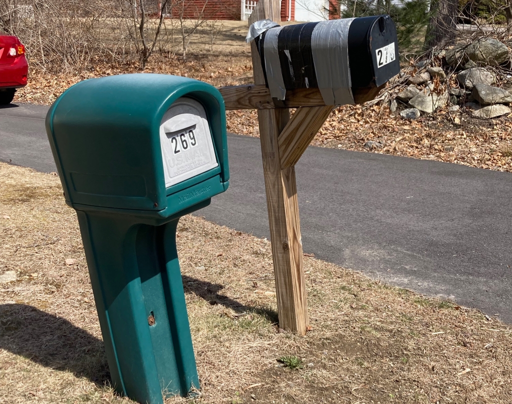 broken duck-taped mailbox